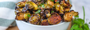 An inviting bowl of perfectly grilled Brussel Sprouts.