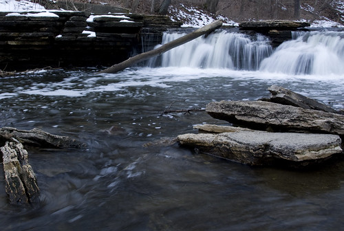 A beautiful and peaceful waterfall feeding a mountain stream.
