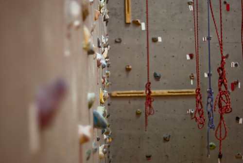 A profile shot of a climbing wall with some ropes at an indoor climbing gym in Colleyville, TX.