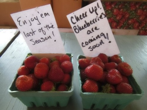 Two baskets of delicious, locally sourced strawberries that are the last of the season.