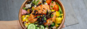 A colorful and scrumptious poke bowl with fresh salmon.