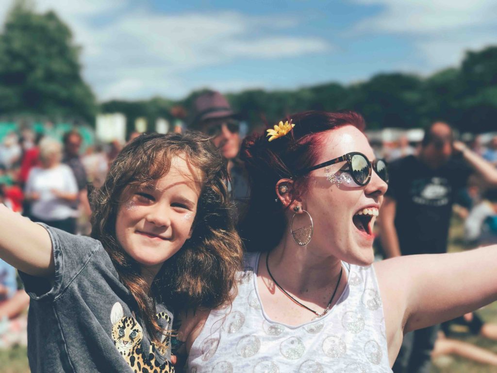 Two girls enjoying life at a local festival.