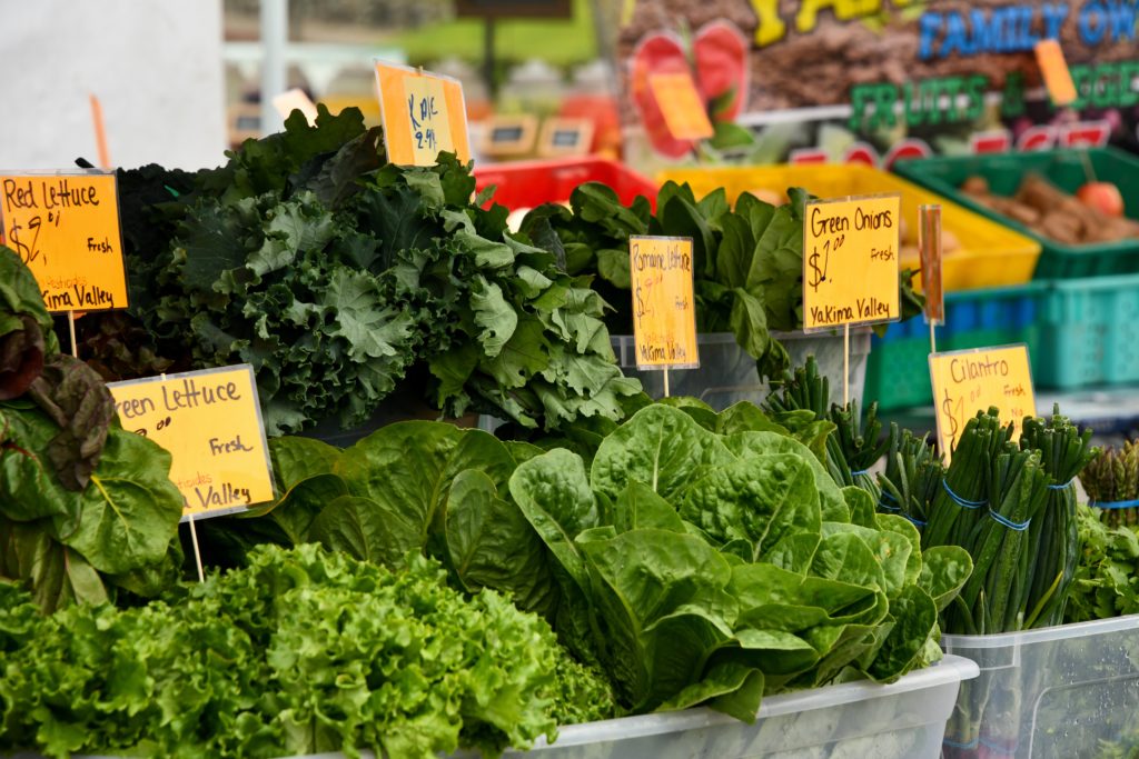 Green, leafy vegetables sit ready for purchase at a farmers market near Gilbert, Arizona