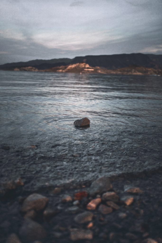 A rock sits in a waterway in North Las Vegas, Nevada