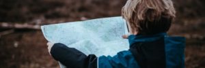 A child looks at a map of the Beaverdam Reservoir during a nature walk in Ashburn, VA