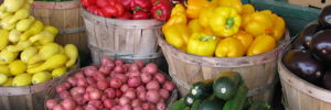 Baskets of fresh vegetables at the farmers market in Carmel, Indiana