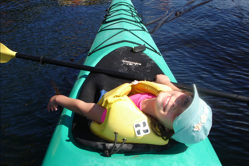 A young girl sits in a kayak on Tempe Town Lake near Mesa, Arizona