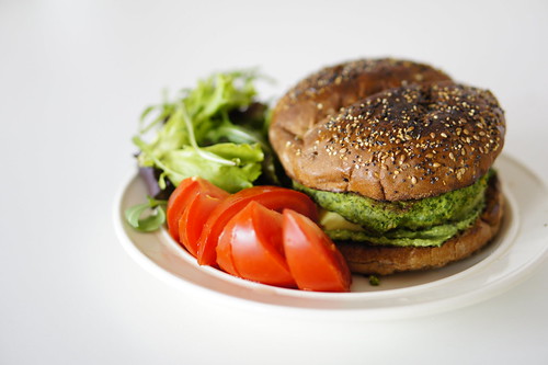 A plant-based burger with side salad for a healthy dinner