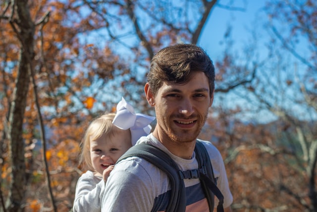 A father walks with his daughter on a hiking trail near Oklahoma City, OK