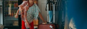 A young girl with her suitcase arriving to a staycation in Goodyear, Arizona