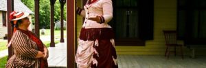 A woman is dressed up as part of a history experience at Conner Prairie in Carmel, Indiana