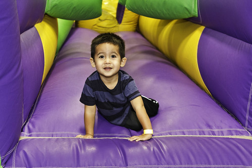 A child plays in a bounce house at an indoor playhouse in Atlanta, Georgia