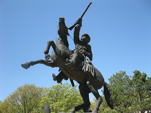A statue of a cowboy located at a museum in Oklahoma City, Oklahoma