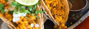 A pair of tacos sit on a plate at a plant-based restaurant in Romeoville, Illinois