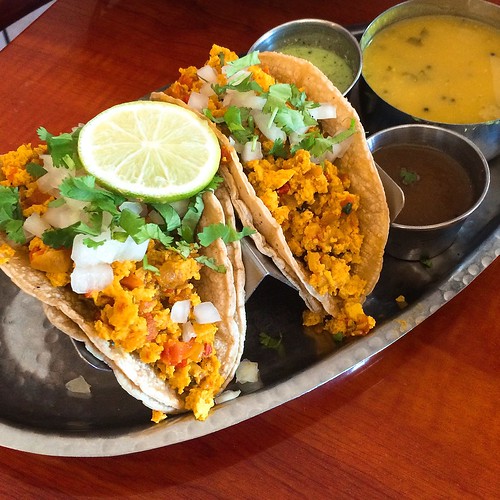 A pair of tacos sit on a plate at a plant-based restaurant in Romeoville, Illinois