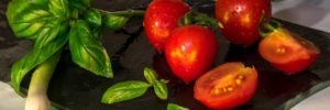 Tomatoes and basil being prepared at a plant-based restaurant in Westmont, Illinois
