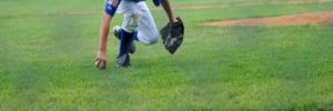 A young boy plays baseball in Westmont, Illinois
