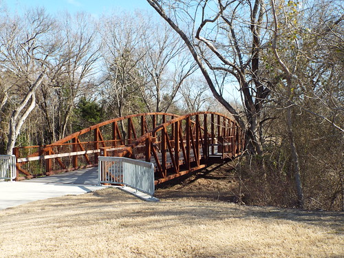 The "Current Drift" bridge art installation sits above Cottonwood Creek in Allen, Texas