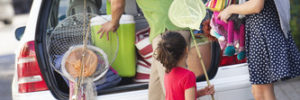 A family unpacks their vehicle as they arrive on their day trip from Ellisville, Missouri