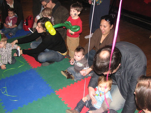 Children play with balloons at a mommy & me class in Westmont, Illinois