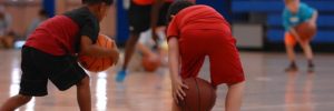 Kids play basketball at a sports facility in Lincoln Park, Illinois
