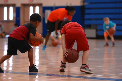 Kids play basketball at a sports facility in Lincoln Park, Illinois
