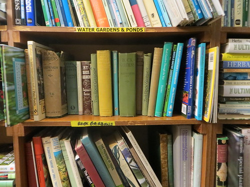 Books rest on a shelf at a bookstore in South Barrington, Illinois