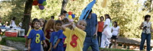 Kids gather around a pinata at a family-friendly party venue in Oklahoma City