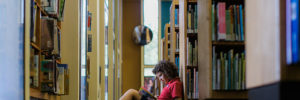 A child enjoys a book at the public library in Westerville, Ohio