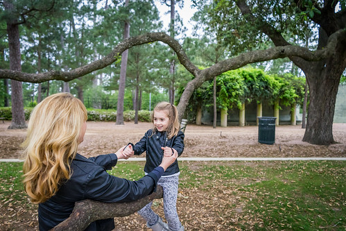 Young daughter and mother enjoying a park in Alpharetta, GA.