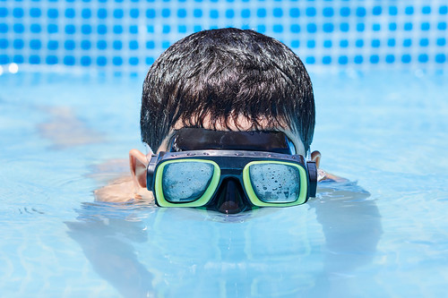 Child wearing goggles in a Chandler, AZ pool