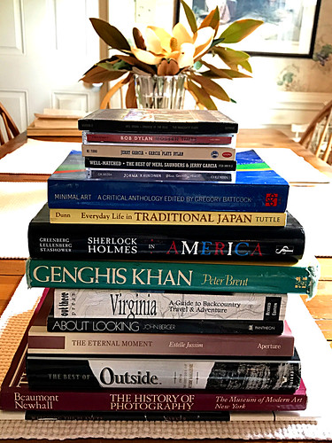 Stack of a books on a table.