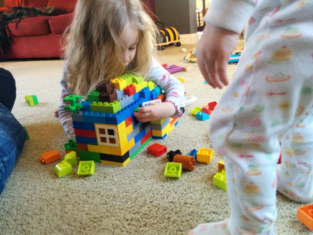 Child stacking blocks
