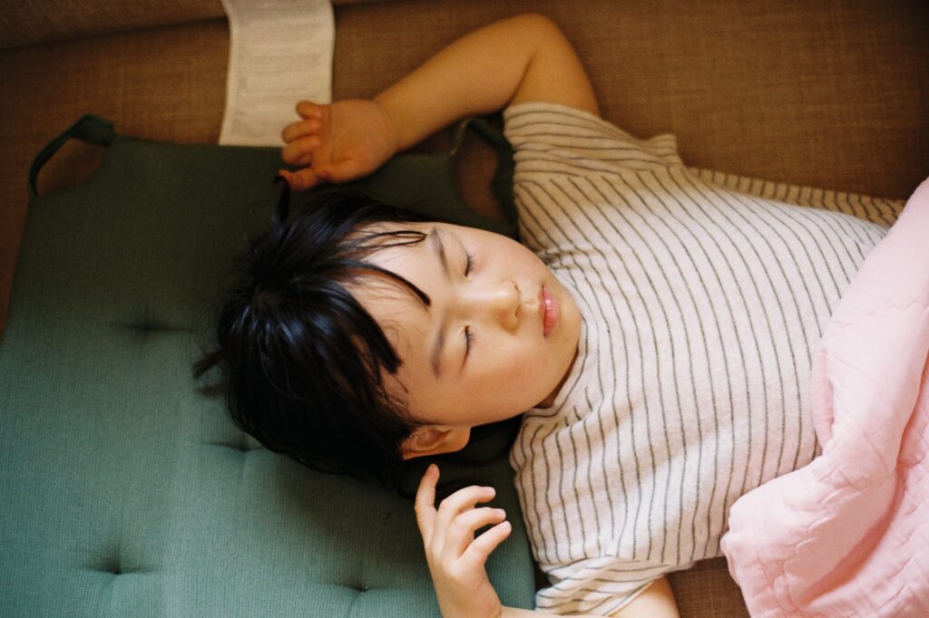 A child taking a nap at a kindergarten