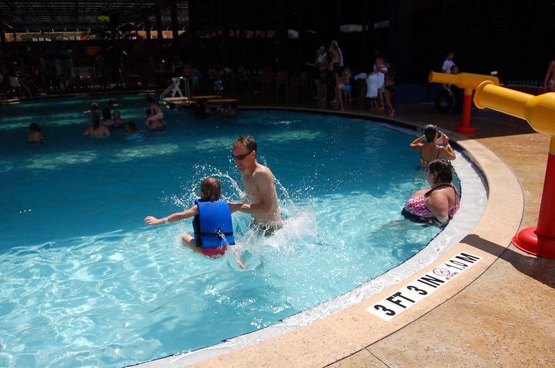 A family swimming in an outdoor pool in Mount Laurel, NJ.
