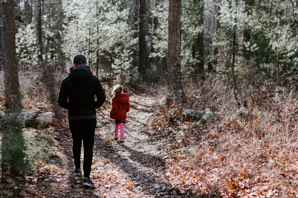 Parent and child enjoying a nature walk in Virginia.