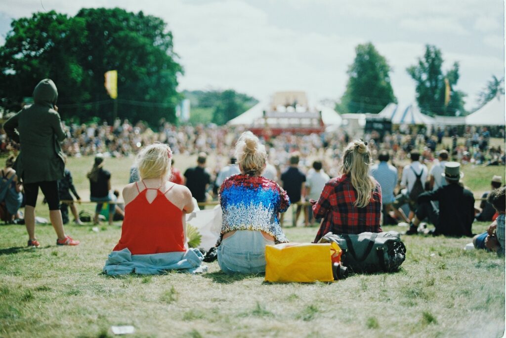 Three people at a festival in Cedar Park, TX