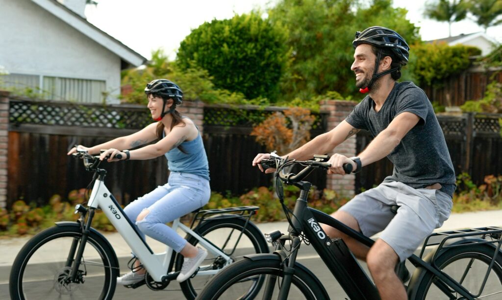 A happy couple biking in Maple Grove, MN