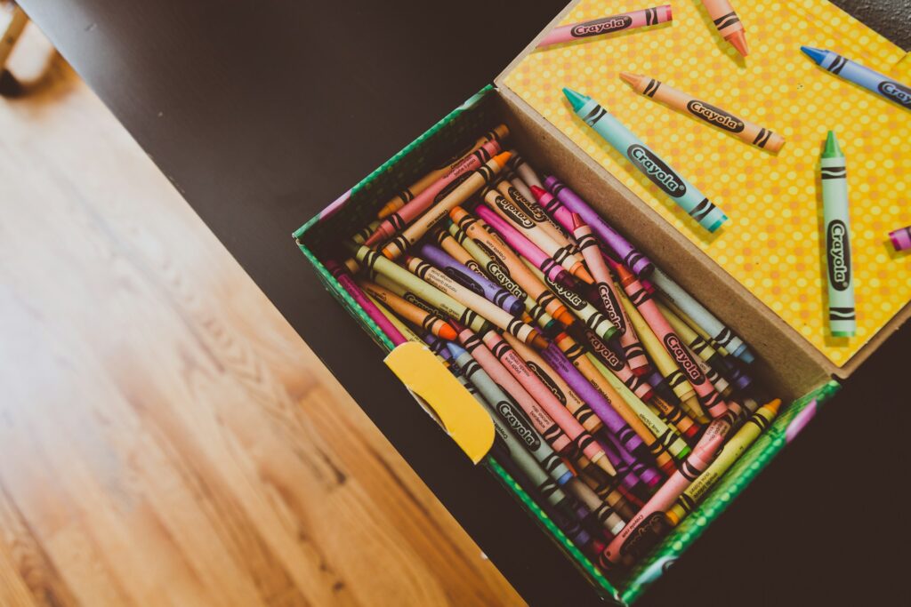 A box of crayons on a table in Plano, TX