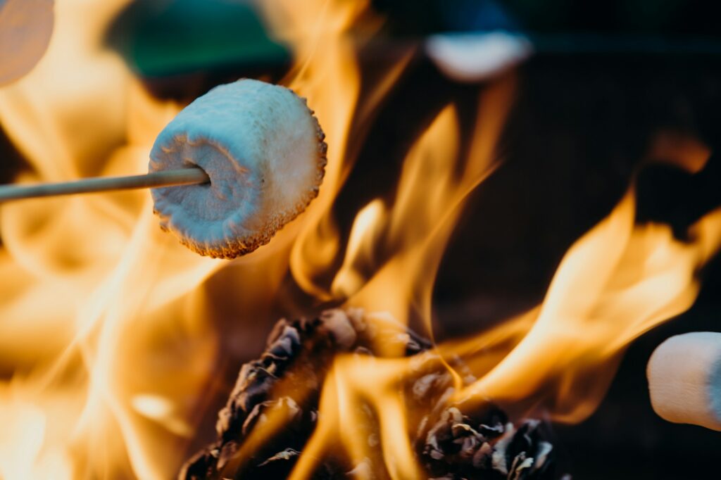 A marshmallow being roasted over a campfire at a site in Colleyville, TX
