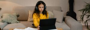 Girl learning languages on a notebook remotely