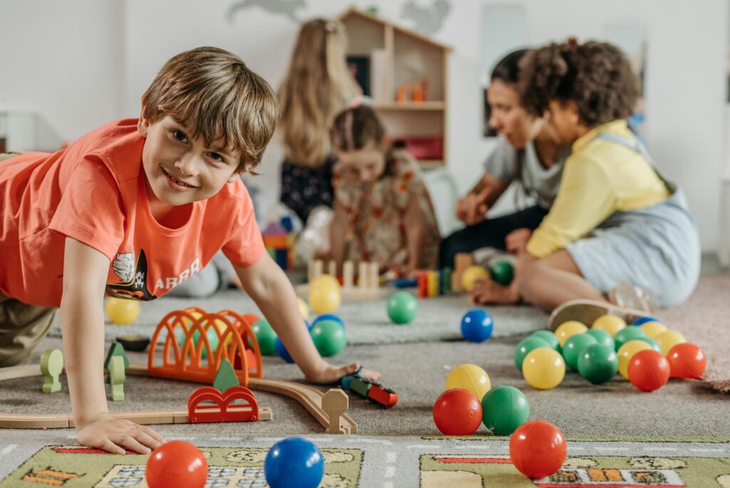 Children playing with balls and toys