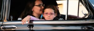 Woman and Child Inside Car