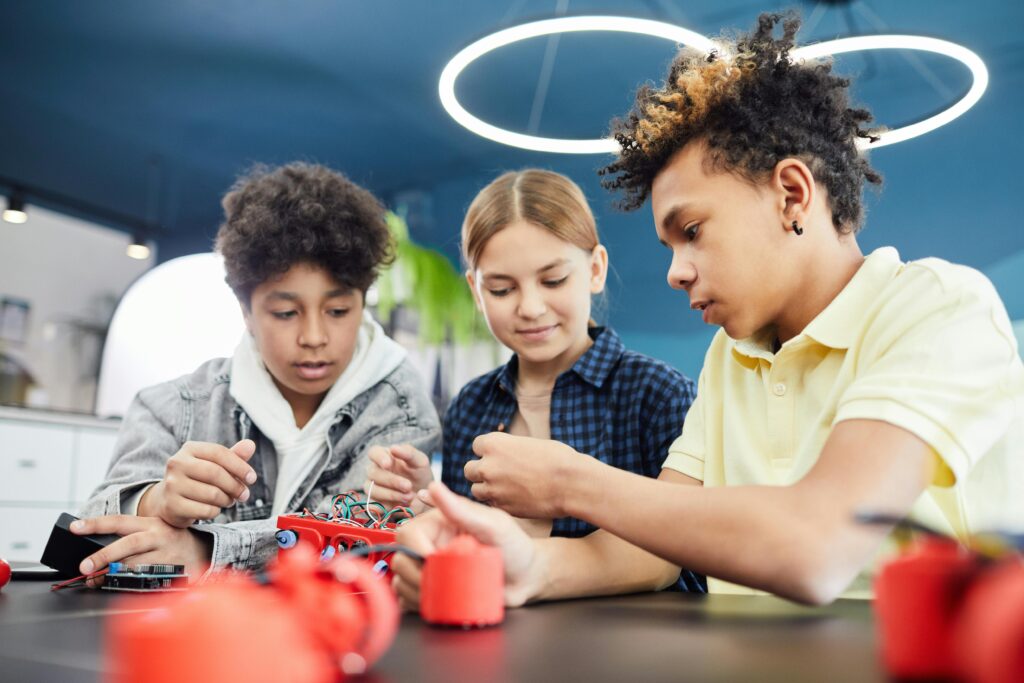 Young Students Doing Robotics Together