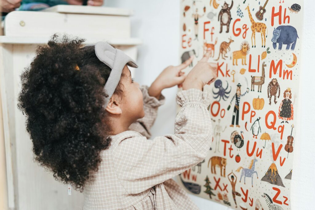 Girl learning the alphabet