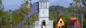 Charming Playground with Clock Tower Slide