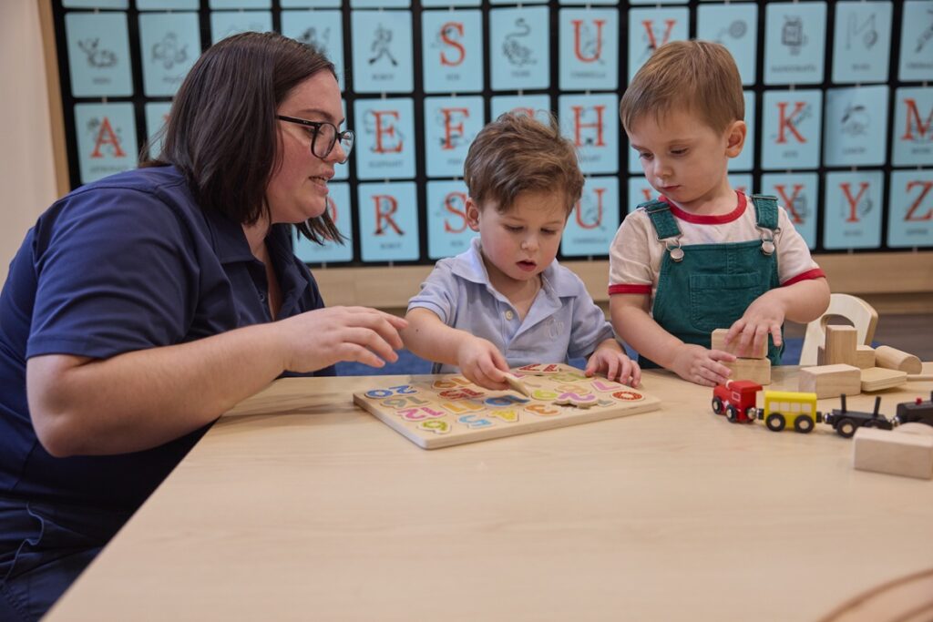 Children stacking blocks and learning