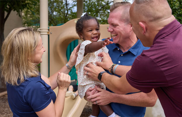 CDLC infant with military officers